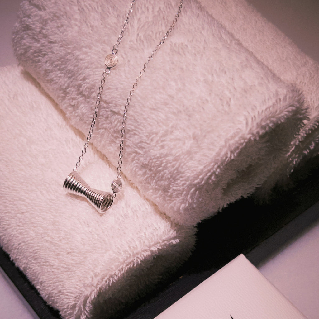Mistveil Ornate-Drum Silver Rhythmic Necklace