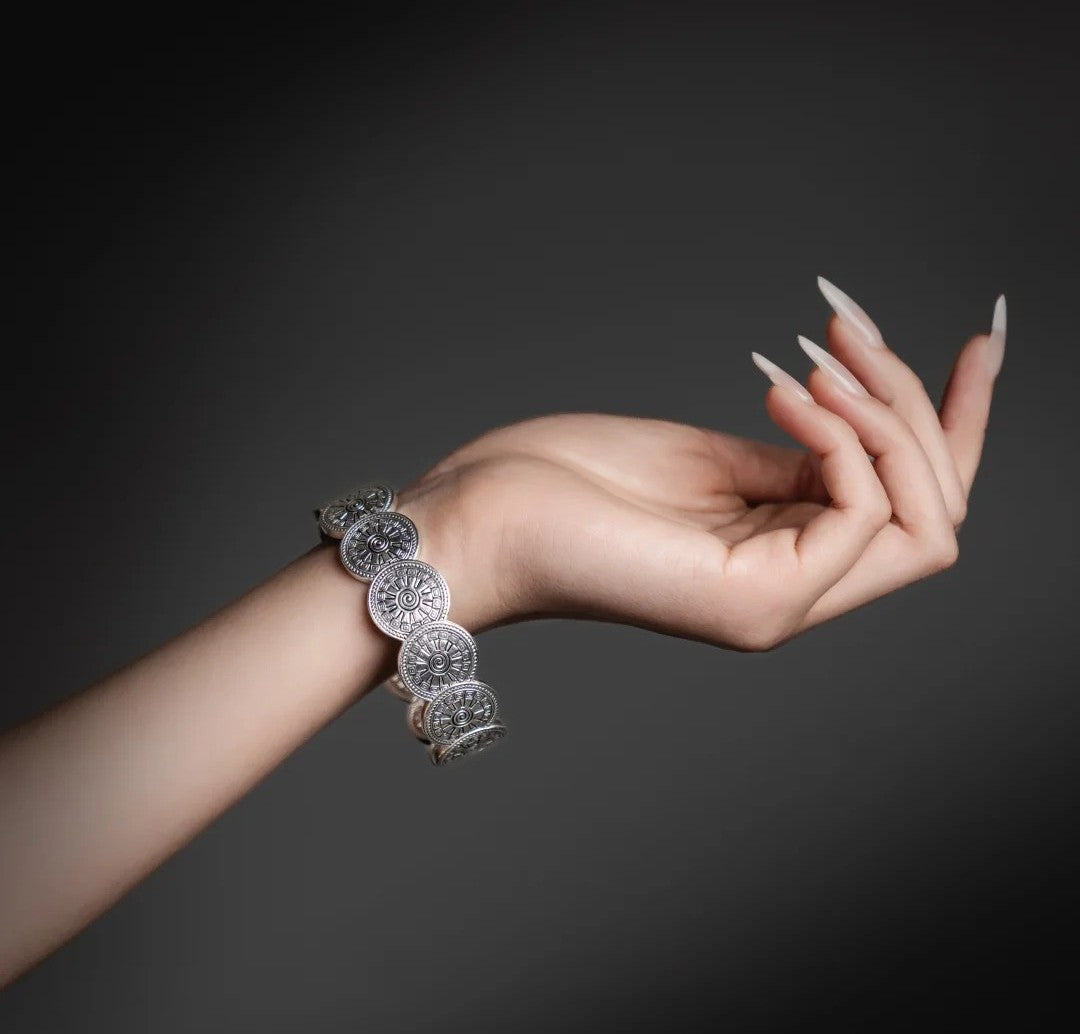 Mistveil Drum-Rhythm Interlocked Silver Protective Bangle