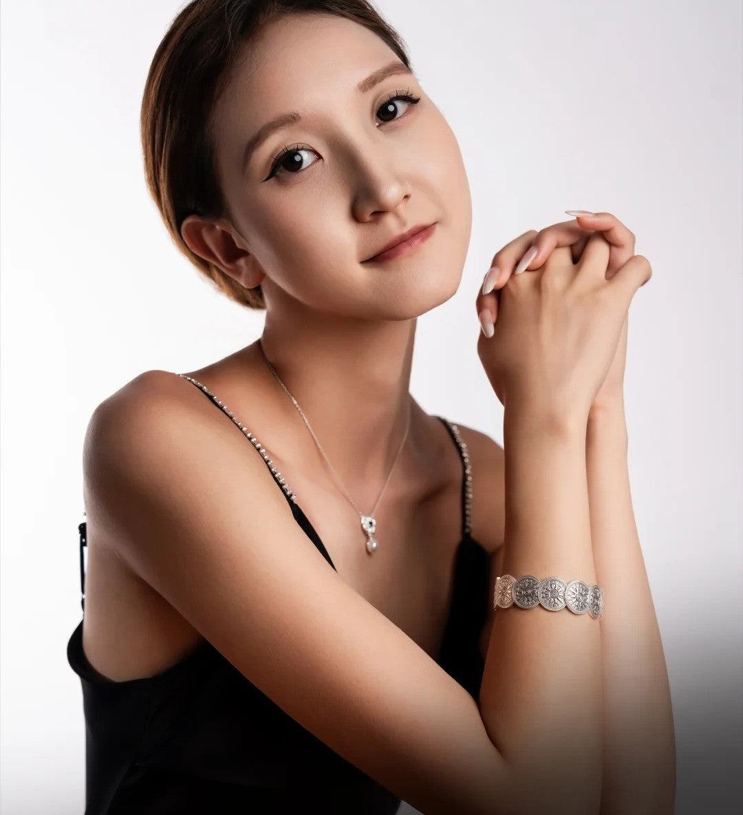 Mistveil Drum-Rhythm Interlocked Silver Protective Bangle