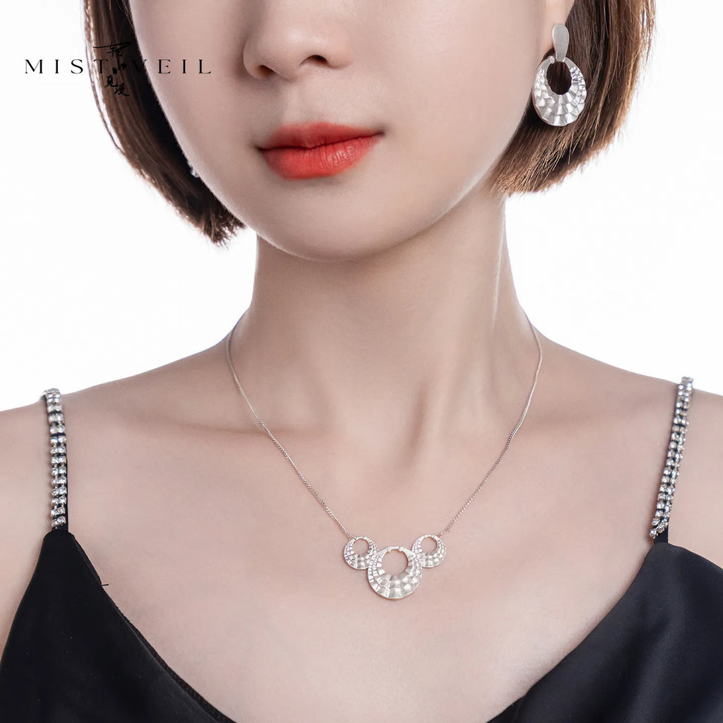 Mistveil Layered-Collar Heritage Silver Protective Earrings